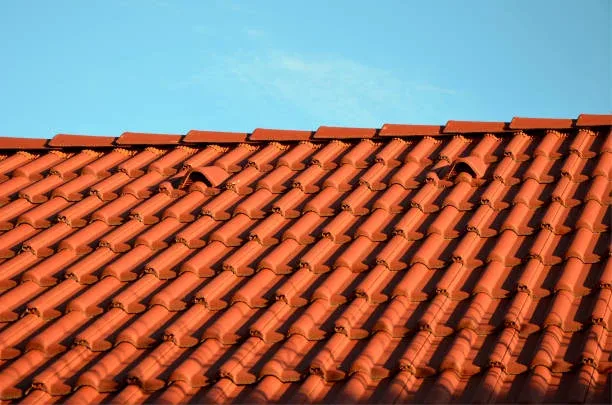 Concrete tile roof prepared for a professional roof coating system