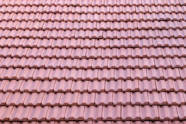 Decramastic roof surface with restored colour and finish